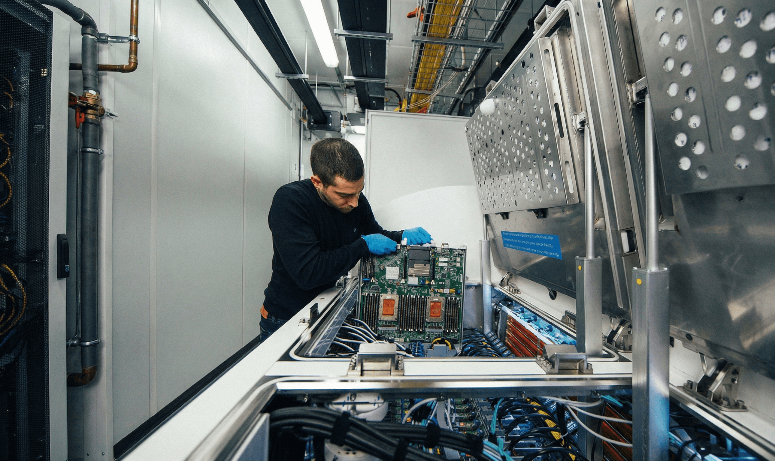 Data center technician working on critical systems